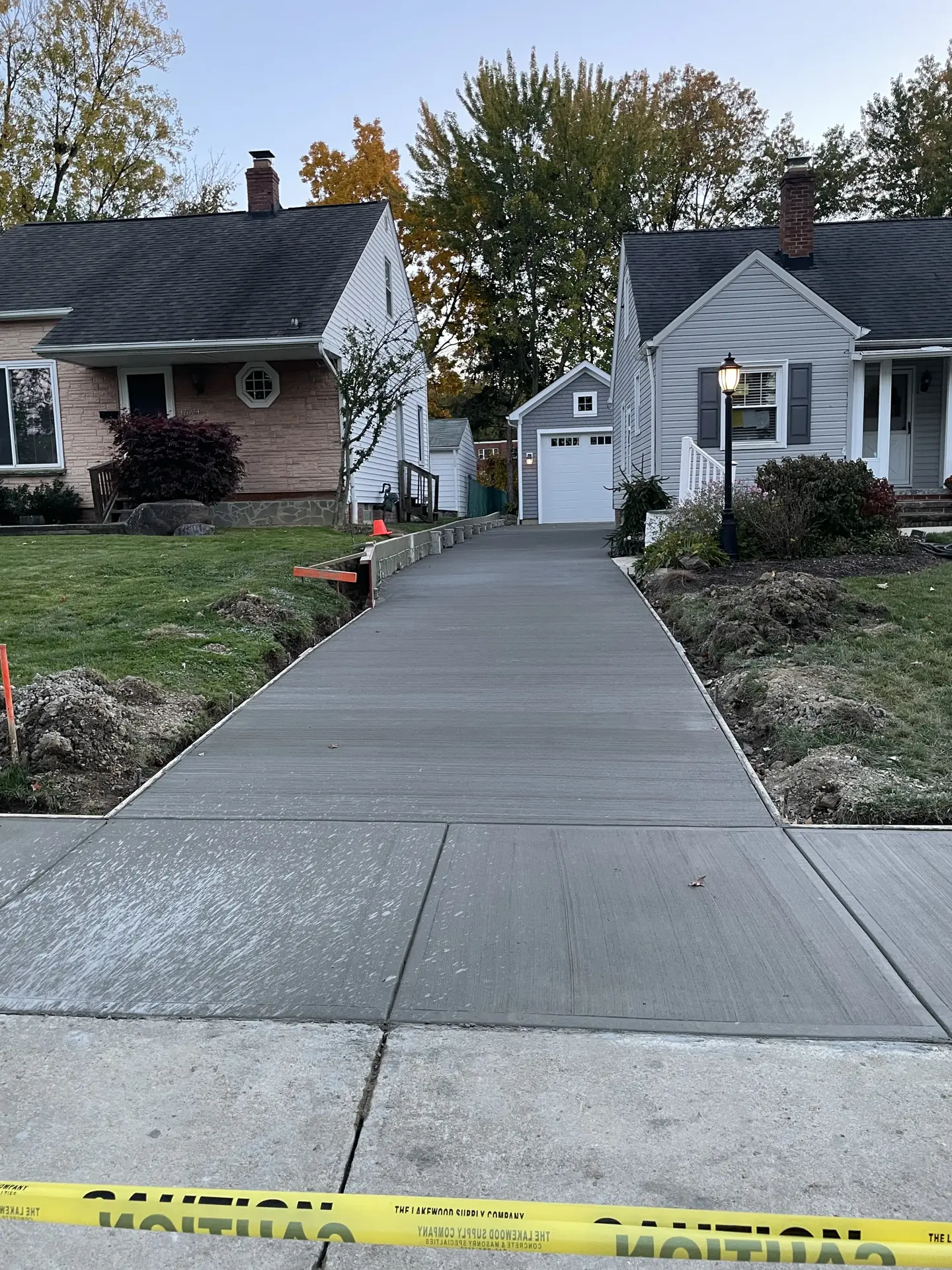 Driveway and neighborhood view during construction
